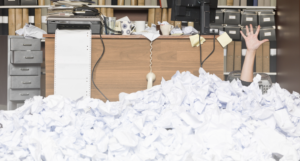 Office with wads of paper overflowing